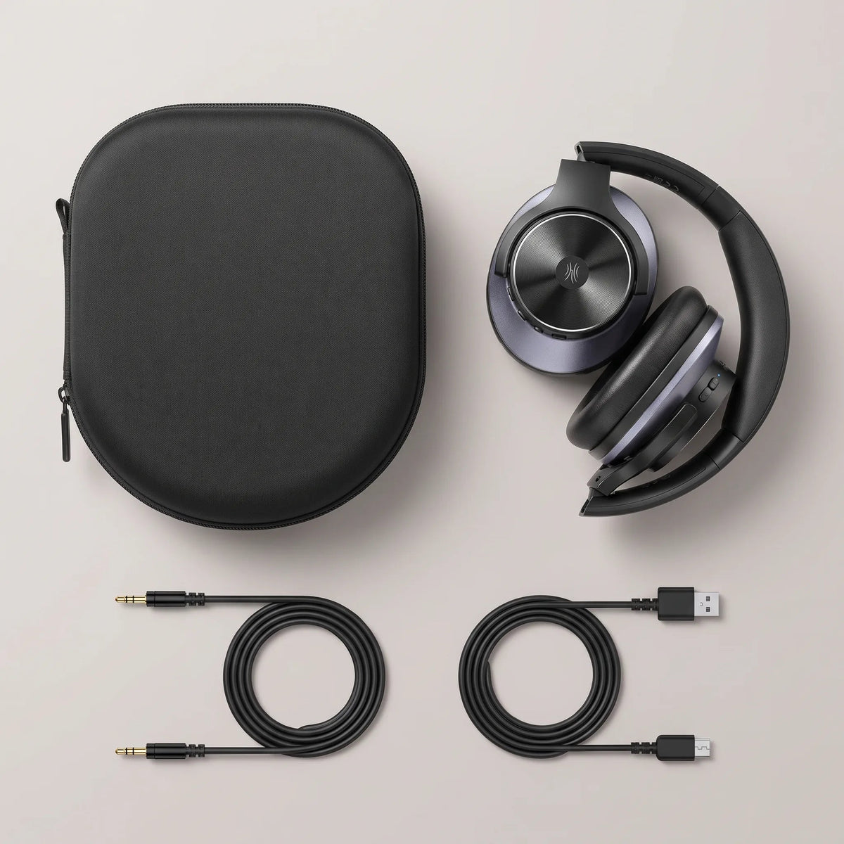 Folded next to the hard case and cables